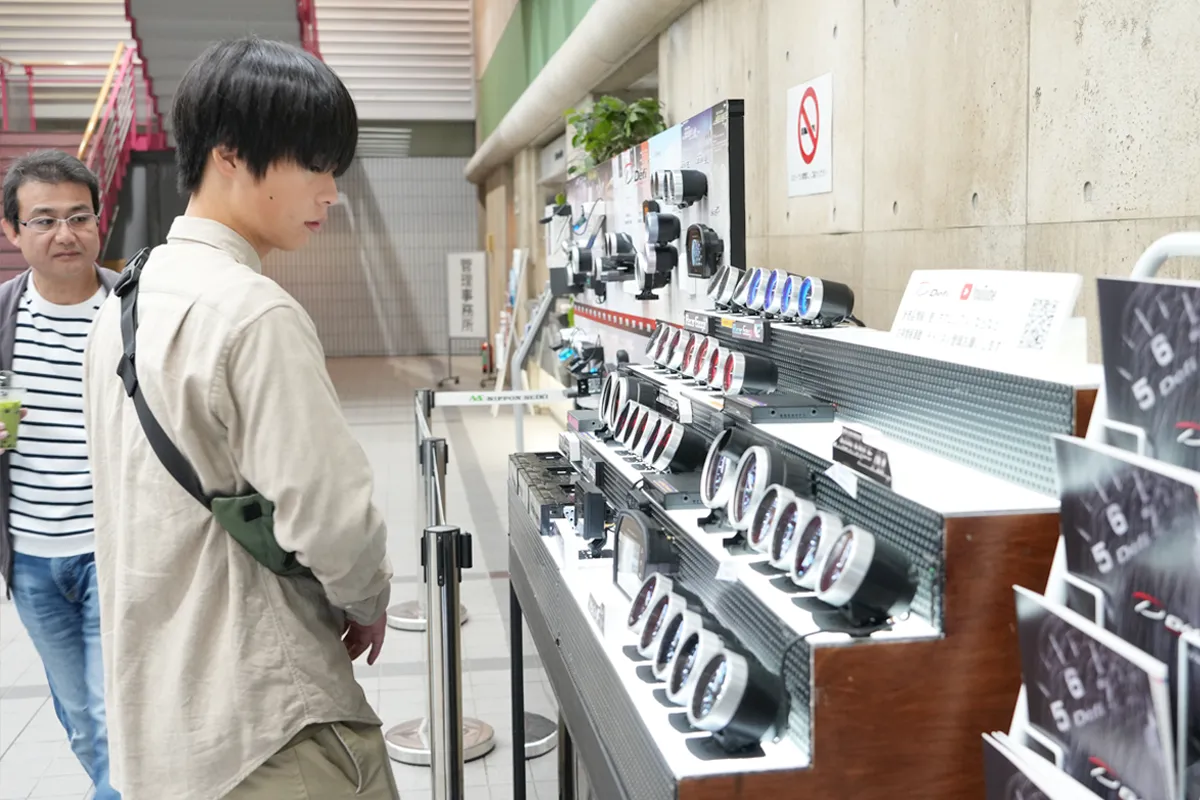 Families observing the displayed products and sensing the employees' dedication