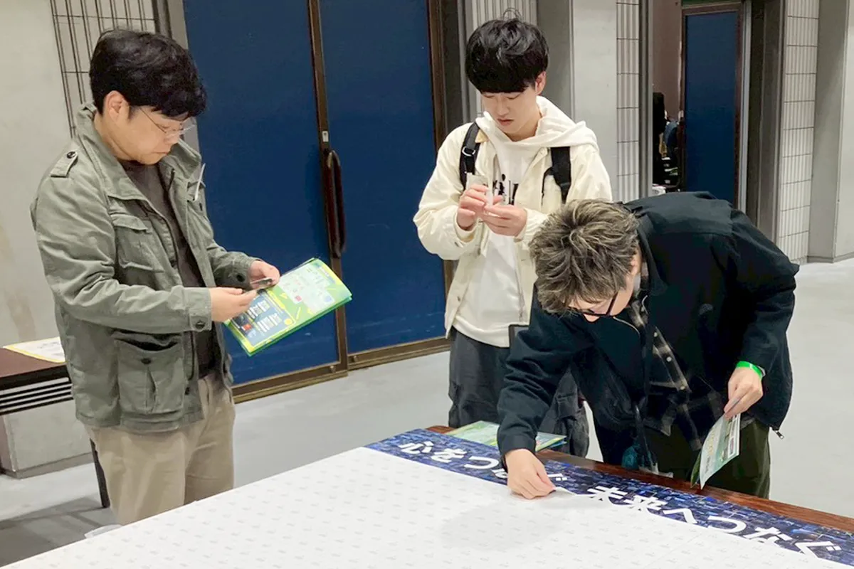 Creating mosaic art, with each participant contributing their hopes for the future